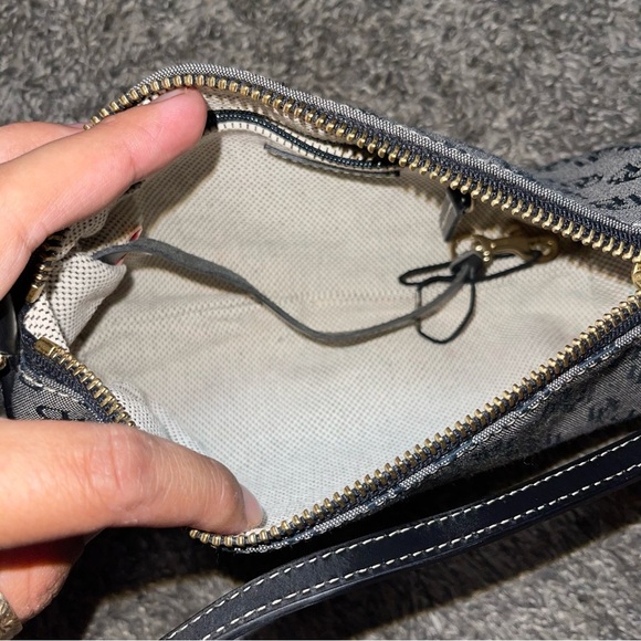 Dooney & Bourke Mini Monogram Canvas
Barrel Bag - Picture 16 of 16